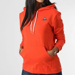 Grosses soldes ✔️ Sweat Capuche Femme 2210800 Orange de Le Coq Sportif ⌛